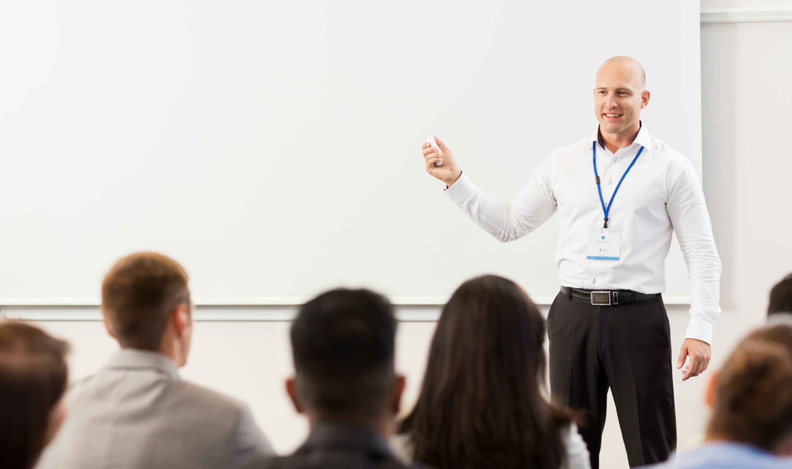 male teacher in a lecture with students