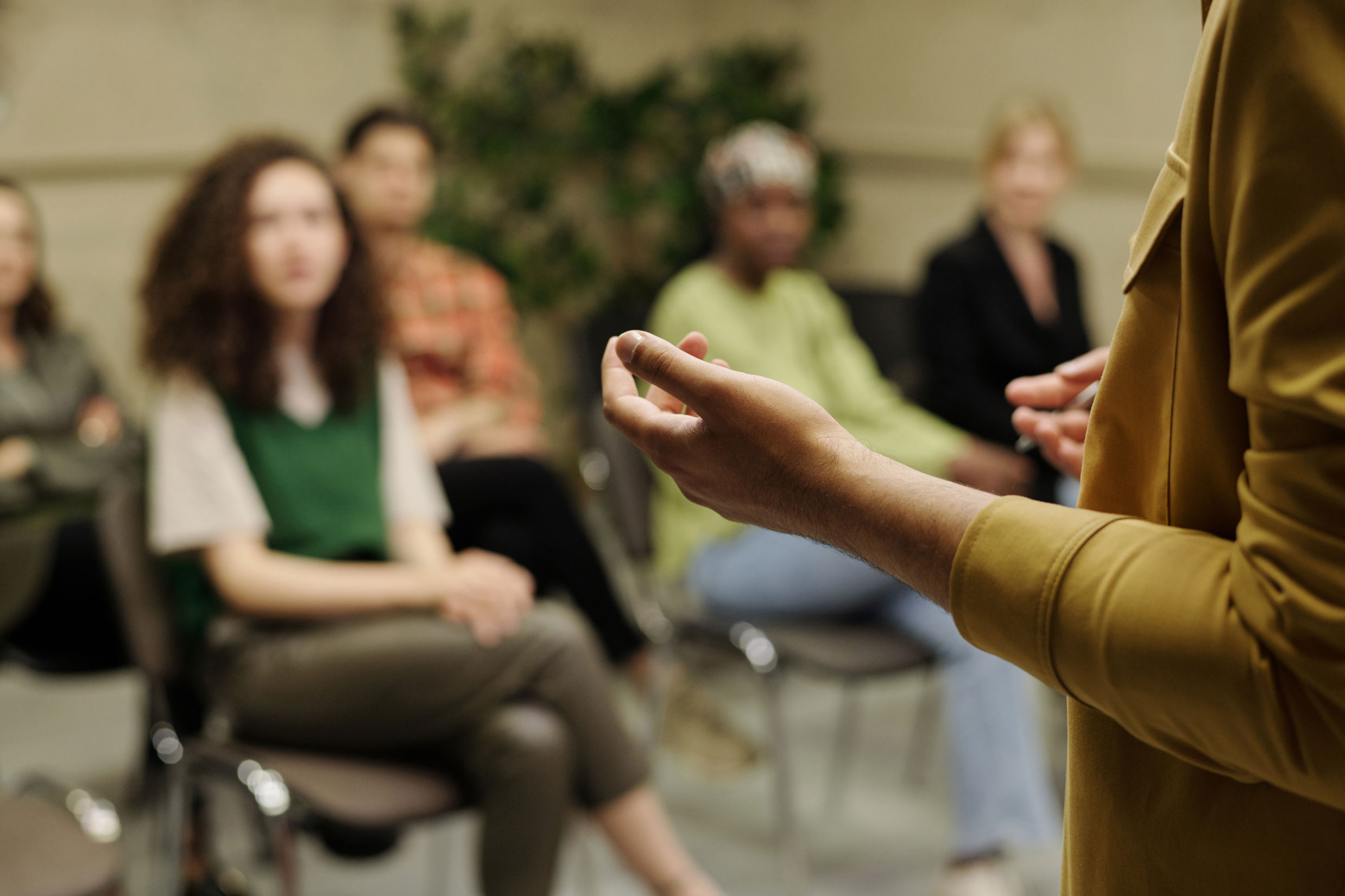 hands of young business coach explaining